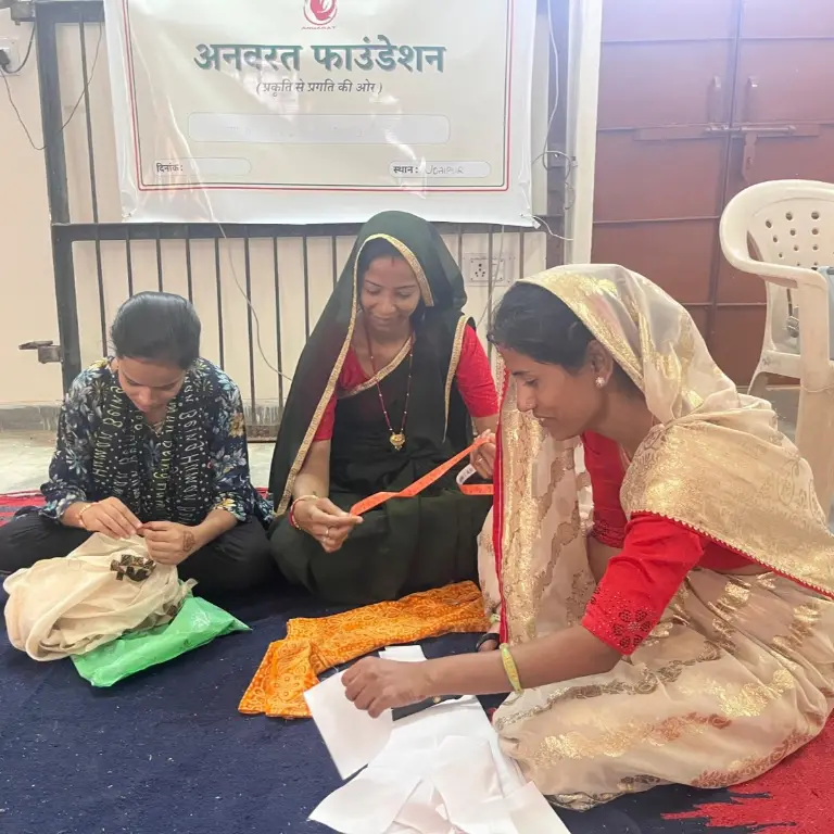 Hands-on stitching work under the Dhagini project