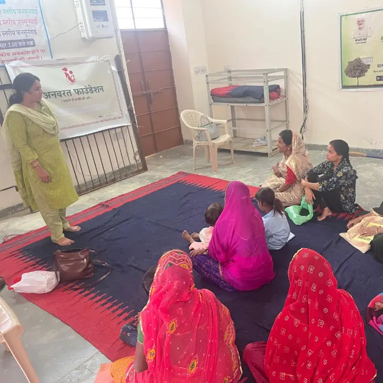 Women participating in the Dhagini stitching initiative