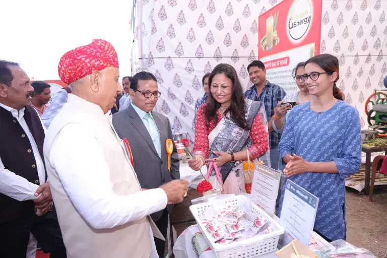 SAVRI exhibition stall with visitors and handmade women livelihood products