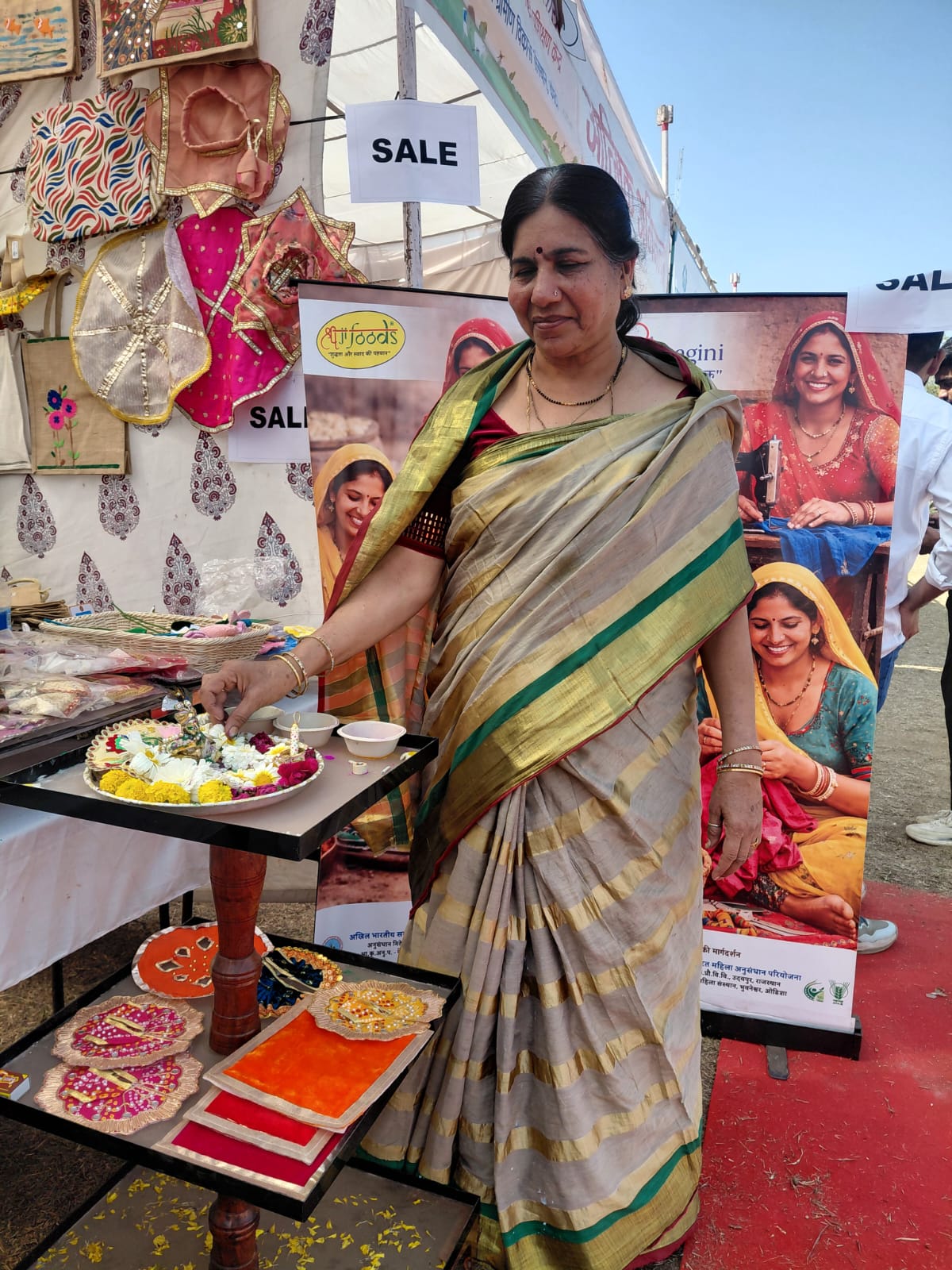 SAVRI initiative display highlighting women-led handmade products and community participation
